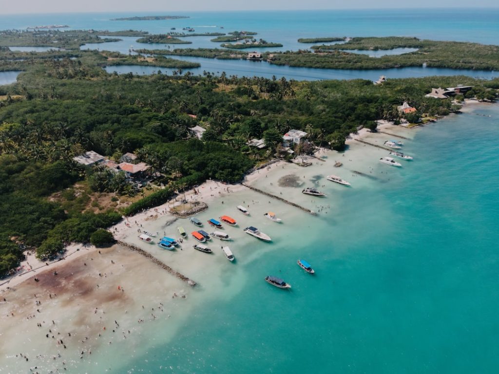 an-aerial-view-of-a-beach-with-boats-in-the-water-b-wyk6-74